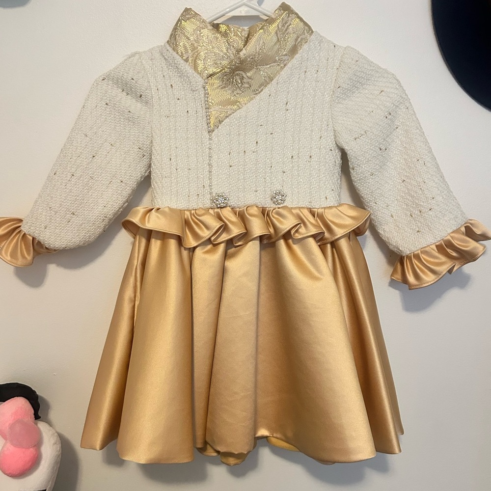 Elegant White and Gold Dress with Ruffles
